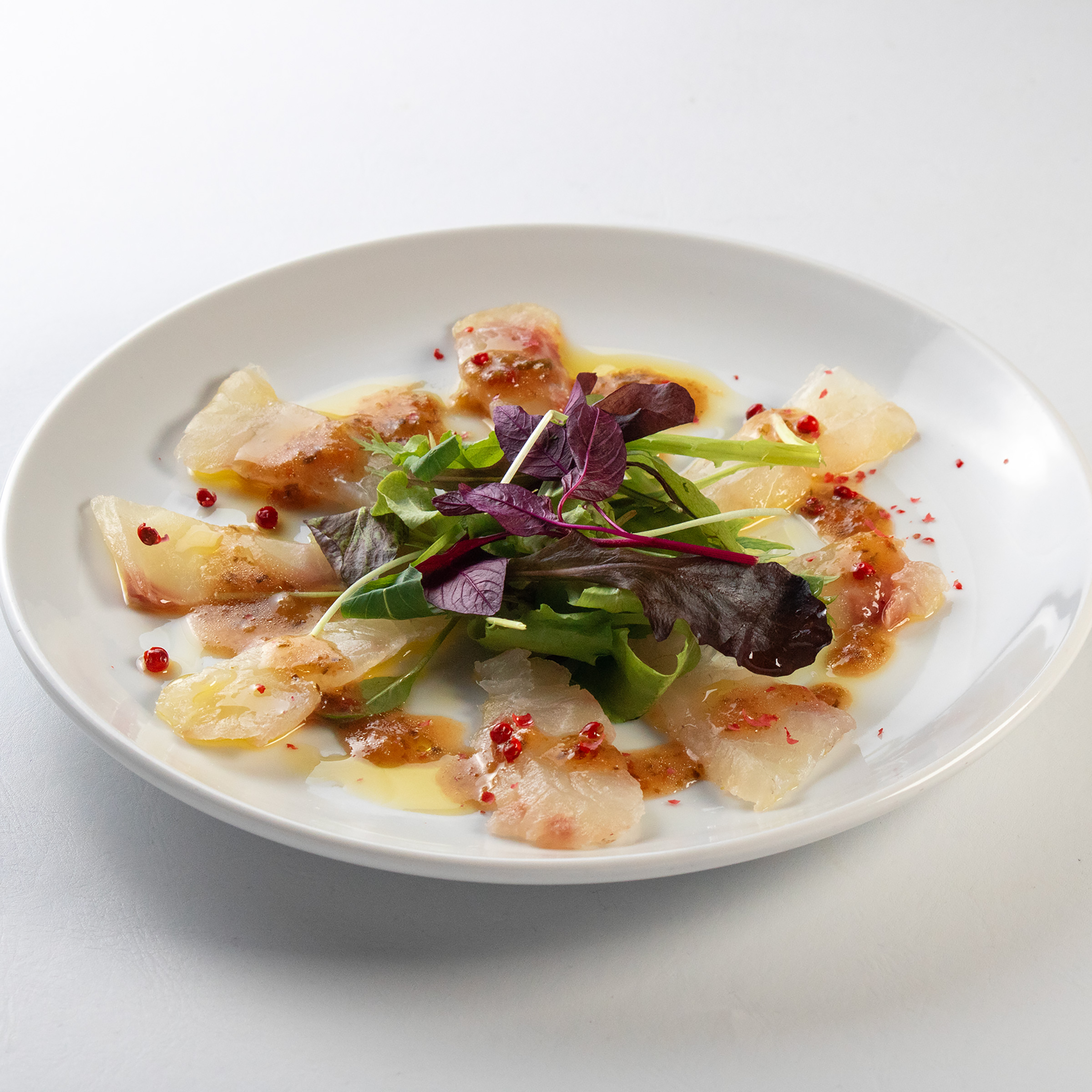 ”特製ソースのカルパッチョ”